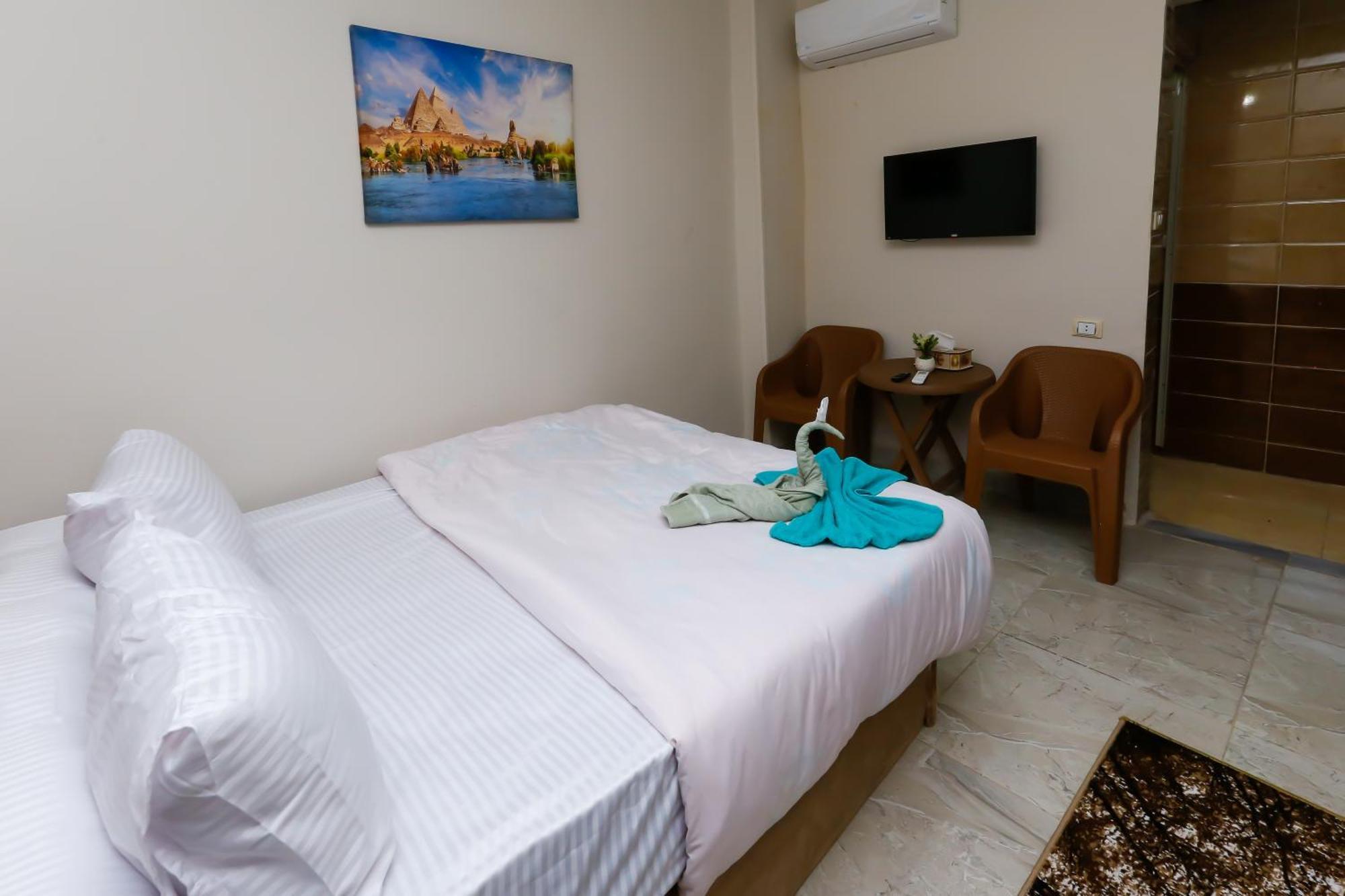 Alloggio in famiglia Sunrise Jacuzzi & Pyramids View *